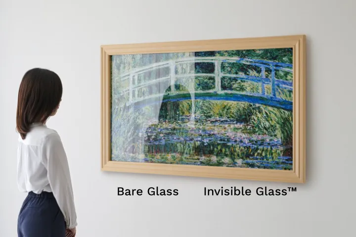 Anti-reflective glass comparison showing reduced reflection on artwork Anti-reflective glass comparison showing reduced reflection on artwork